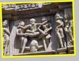 (27/44): Typowa figura erotyczna w Khajuraho-oparta jest na w-<br><br>iczeniu yogi sheerasana.
